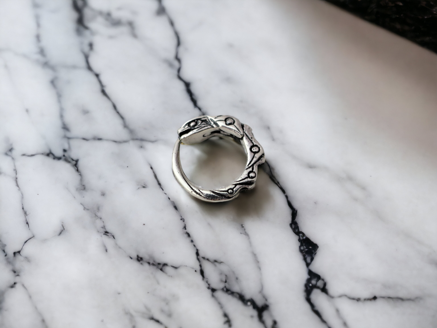 Tiny hoop earrings Ouroboros sterling silver