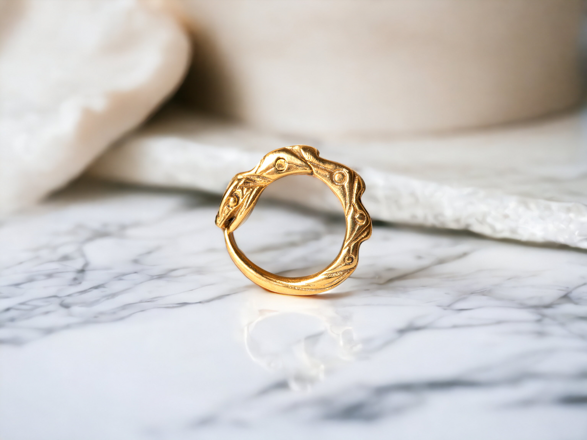 Gold plated small hoop cartilage earring ouroboros