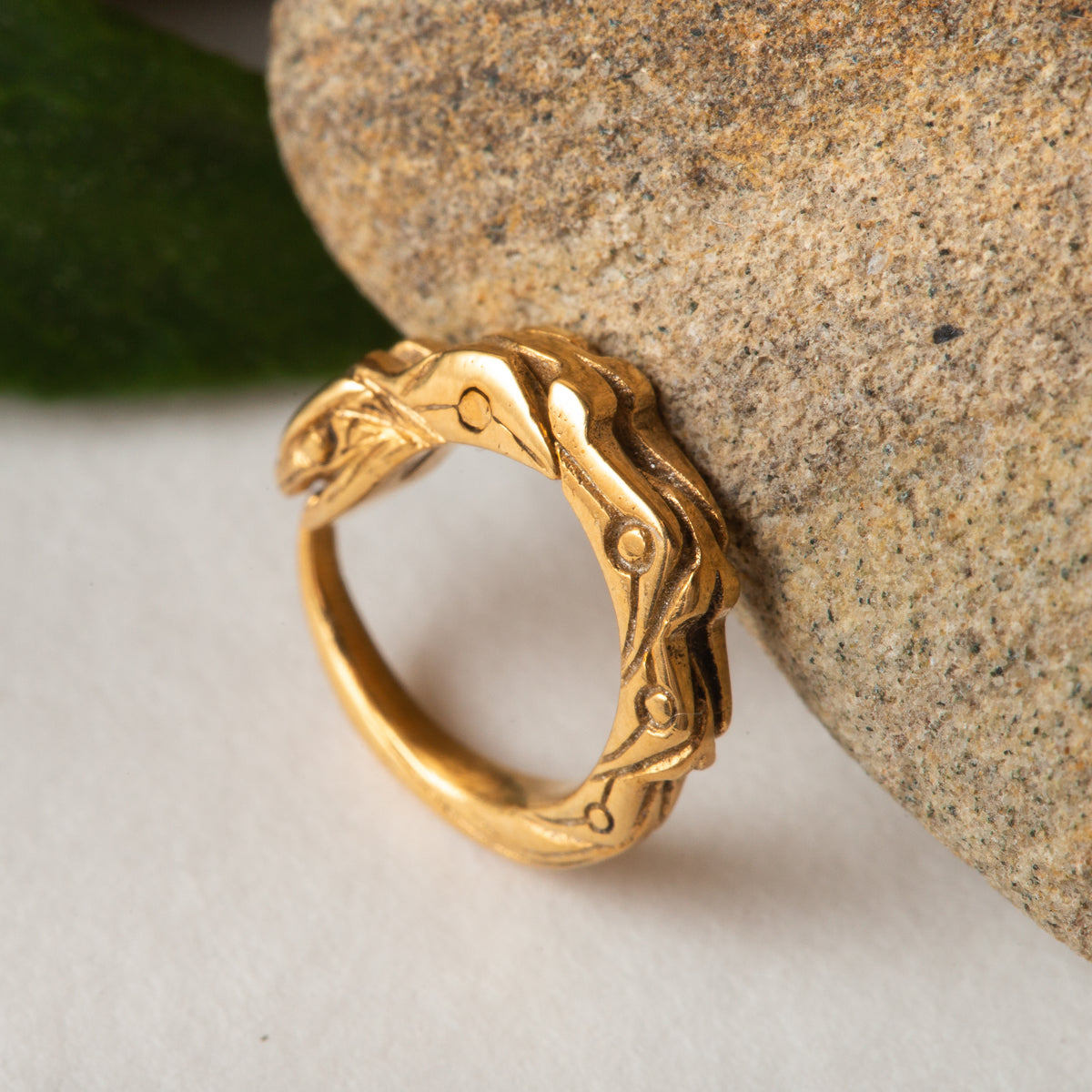 Gold plated small hoop cartilage earring ouroboros