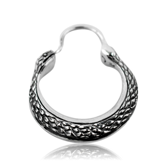 Silver hoop earring with intricate design on a white background