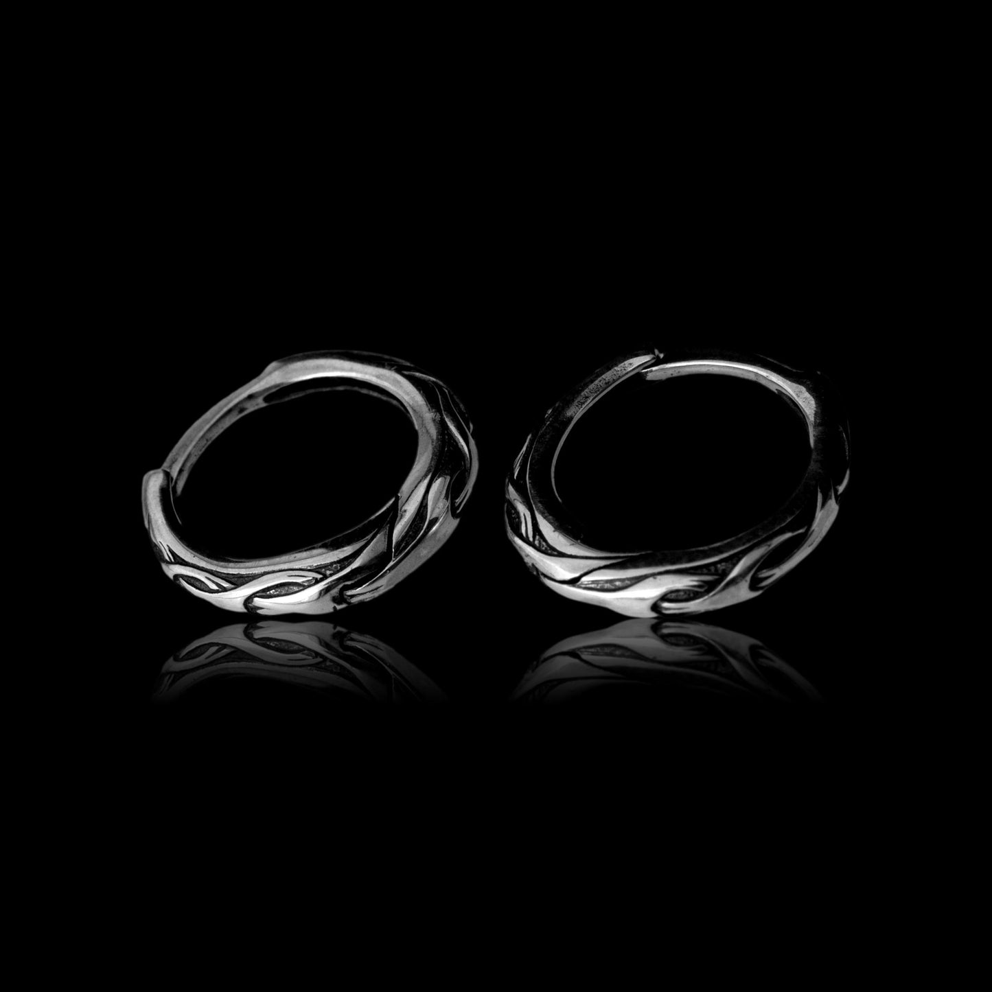 Silver hoop earrings with waved unique ornament for men or women