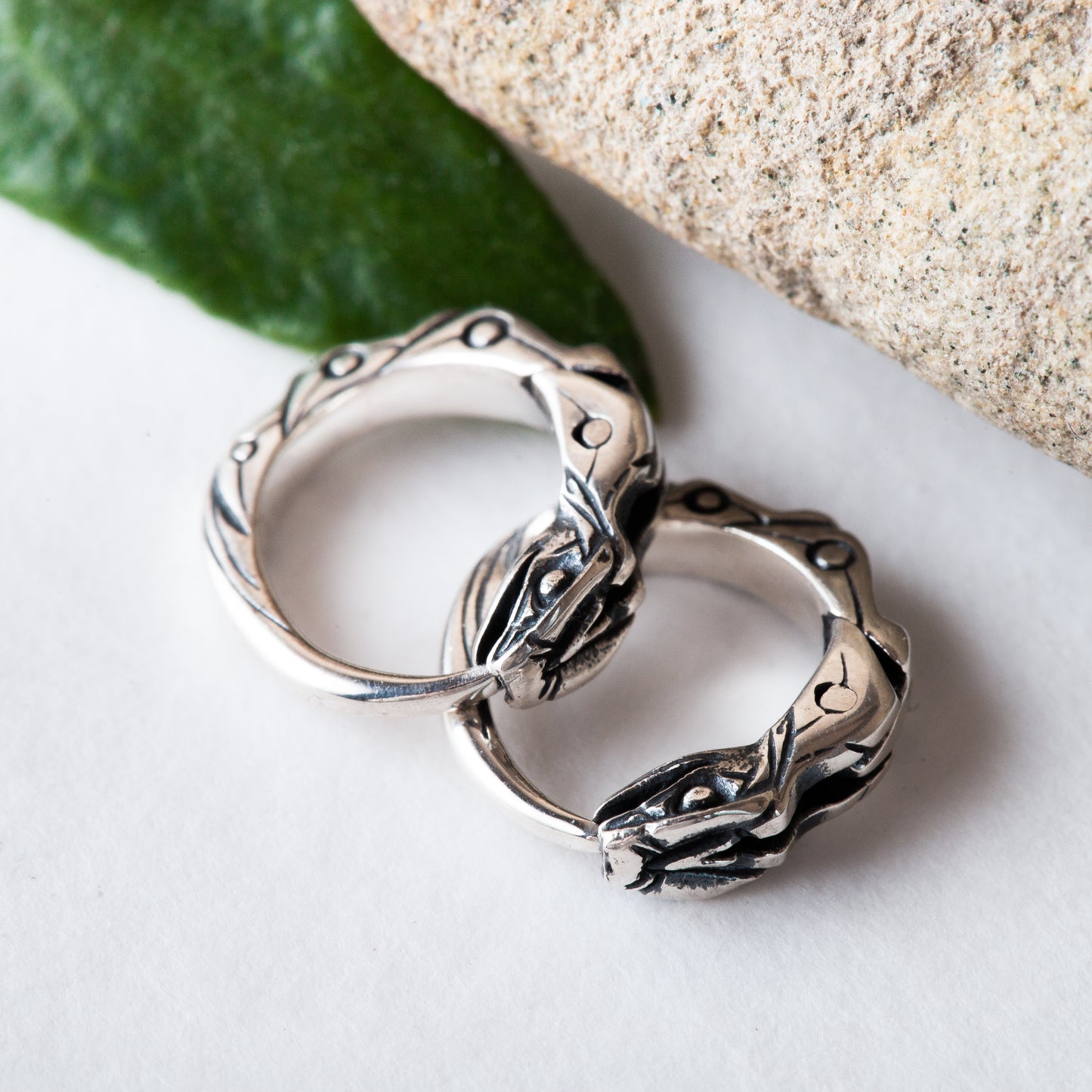 Tiny hoop earrings Ouroboros sterling silver