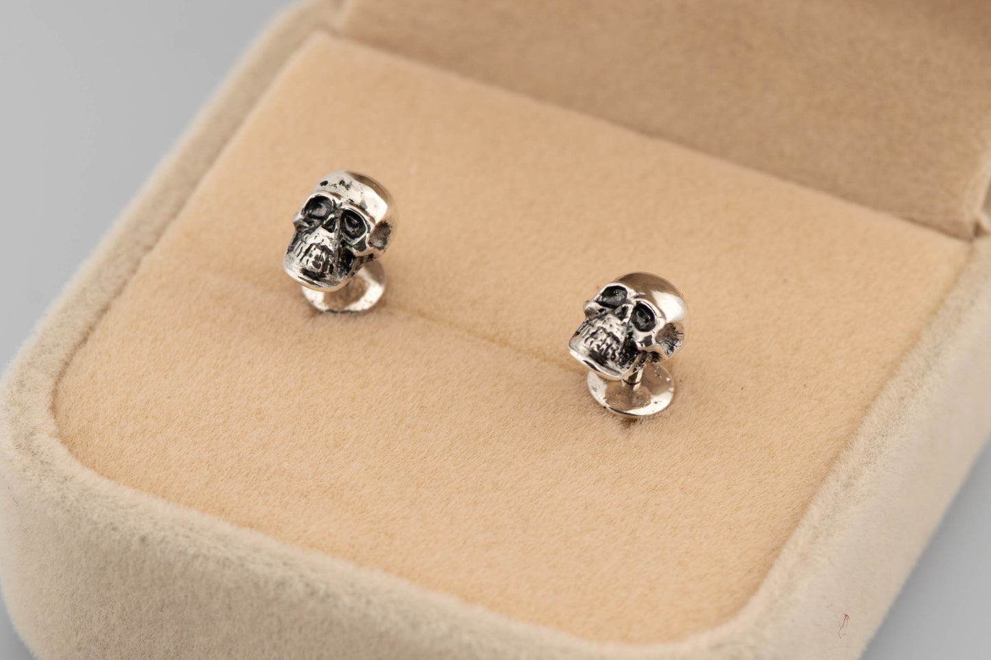 Skull earrings simple studs sterling silver