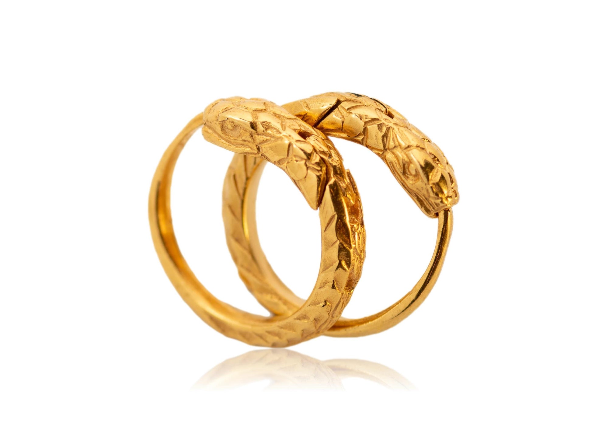 A pair of gold-plated silver hoop earrings with an ouroboros design.
