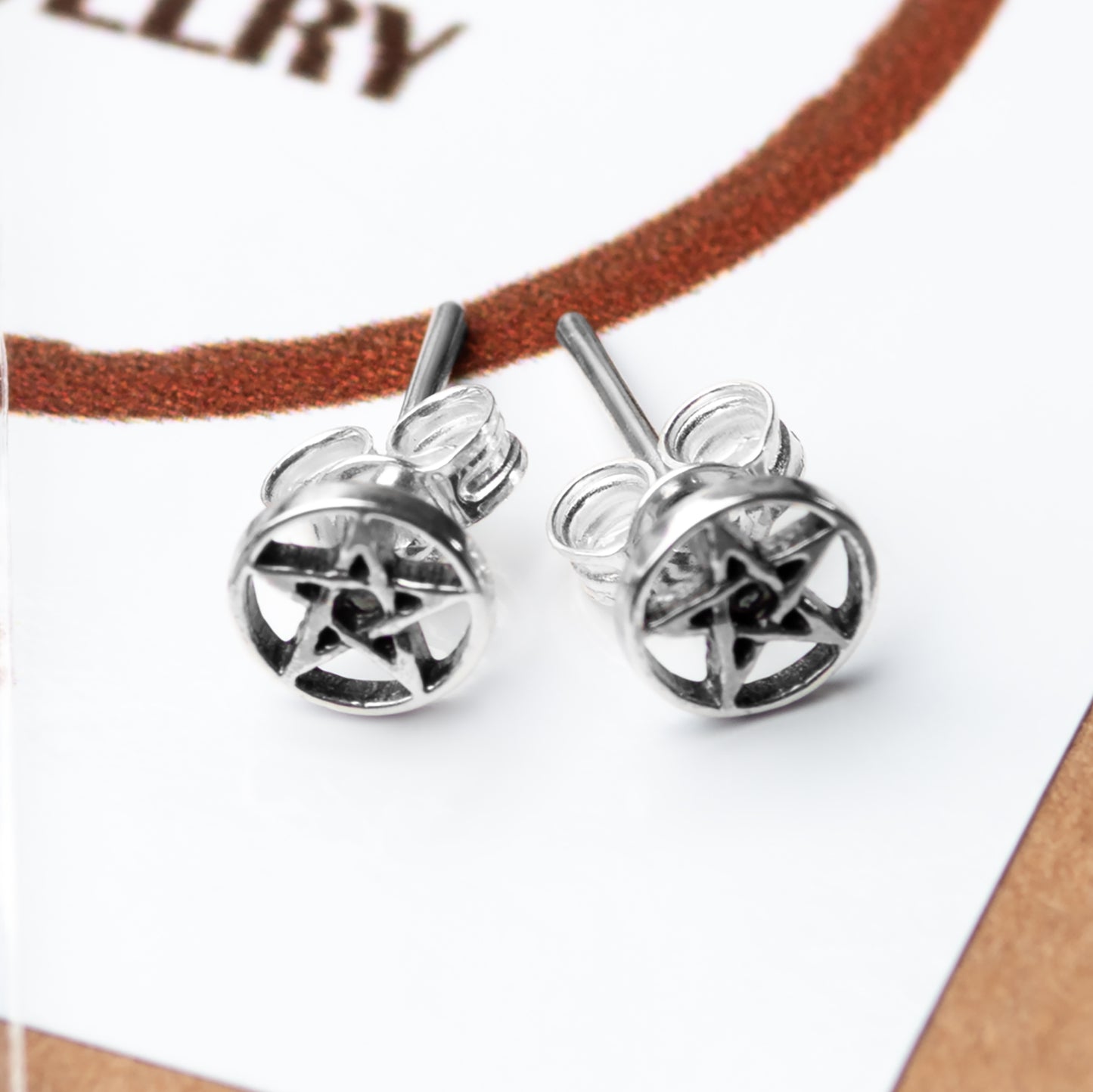 Sterling silver stud earrings pentagram star